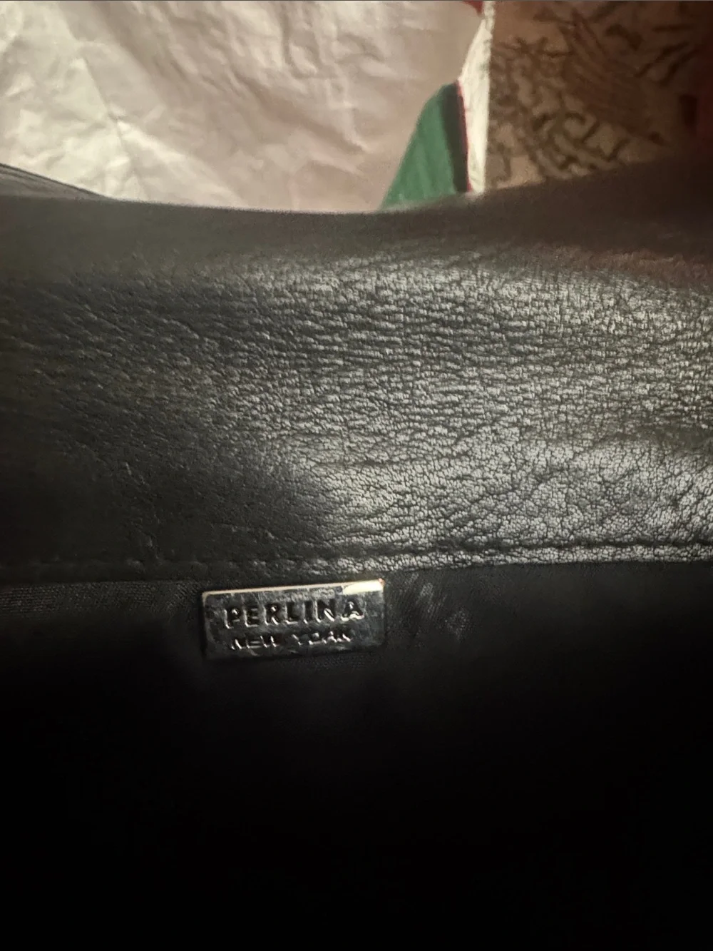 Perlina Black Leather Fold-Over Crossbody with Metal Plaque